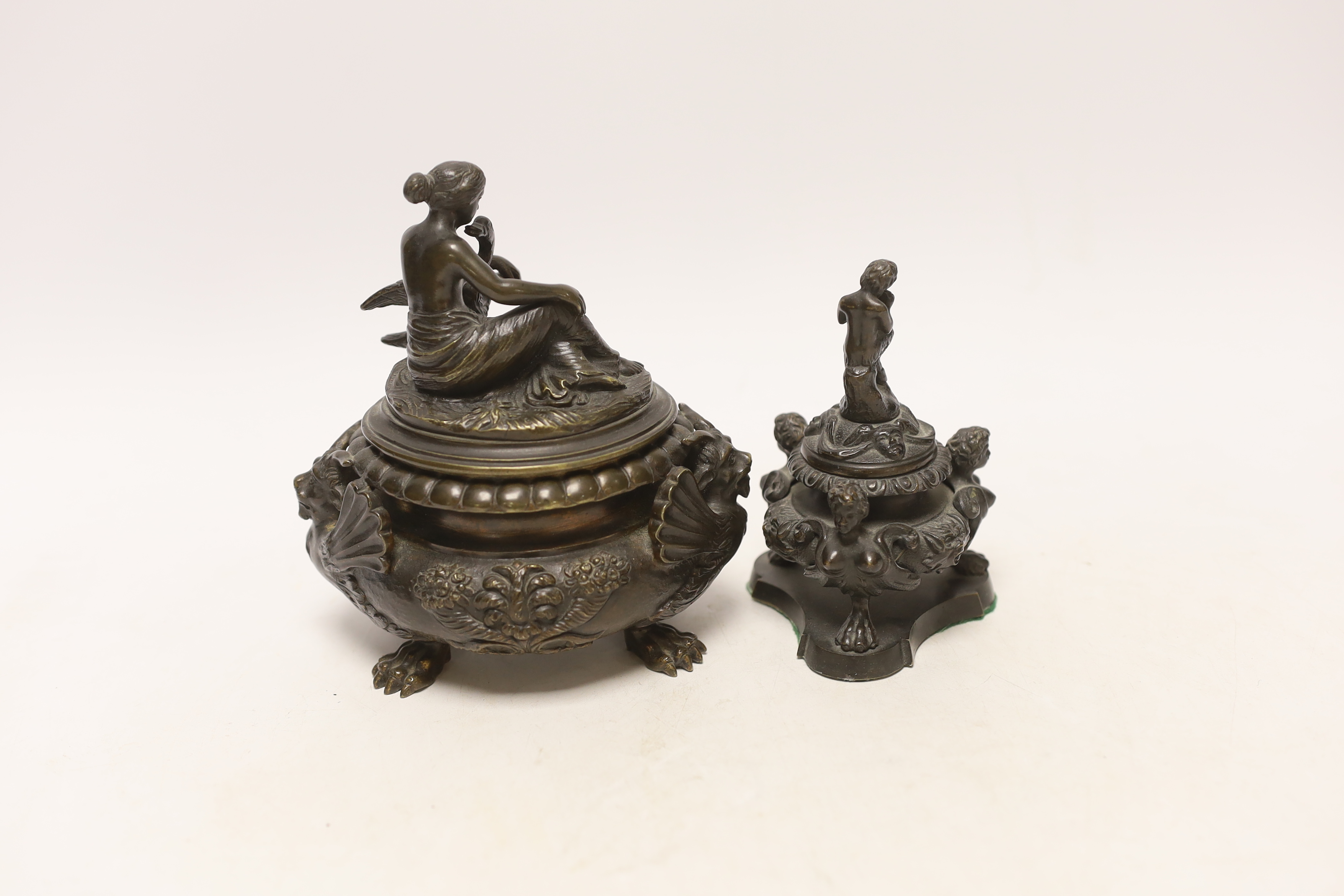 A classical revival bronze Leda and the swan vessel and a Pan playing the pipes inkwell